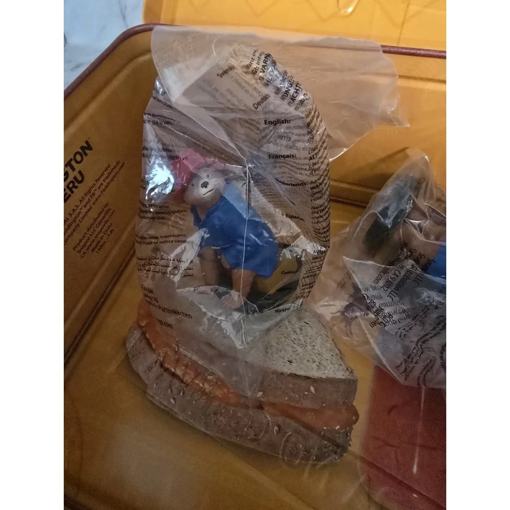 AMC exclusive Paddington in Peru popcorn bucket styled as a suitcase With 2 Bear